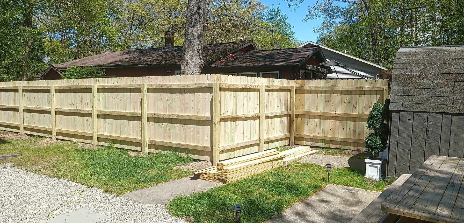 Wood privacy fence in a West Michigan backyard